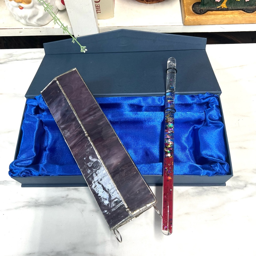 Kaleidoscope with prismatic oil wand in original box